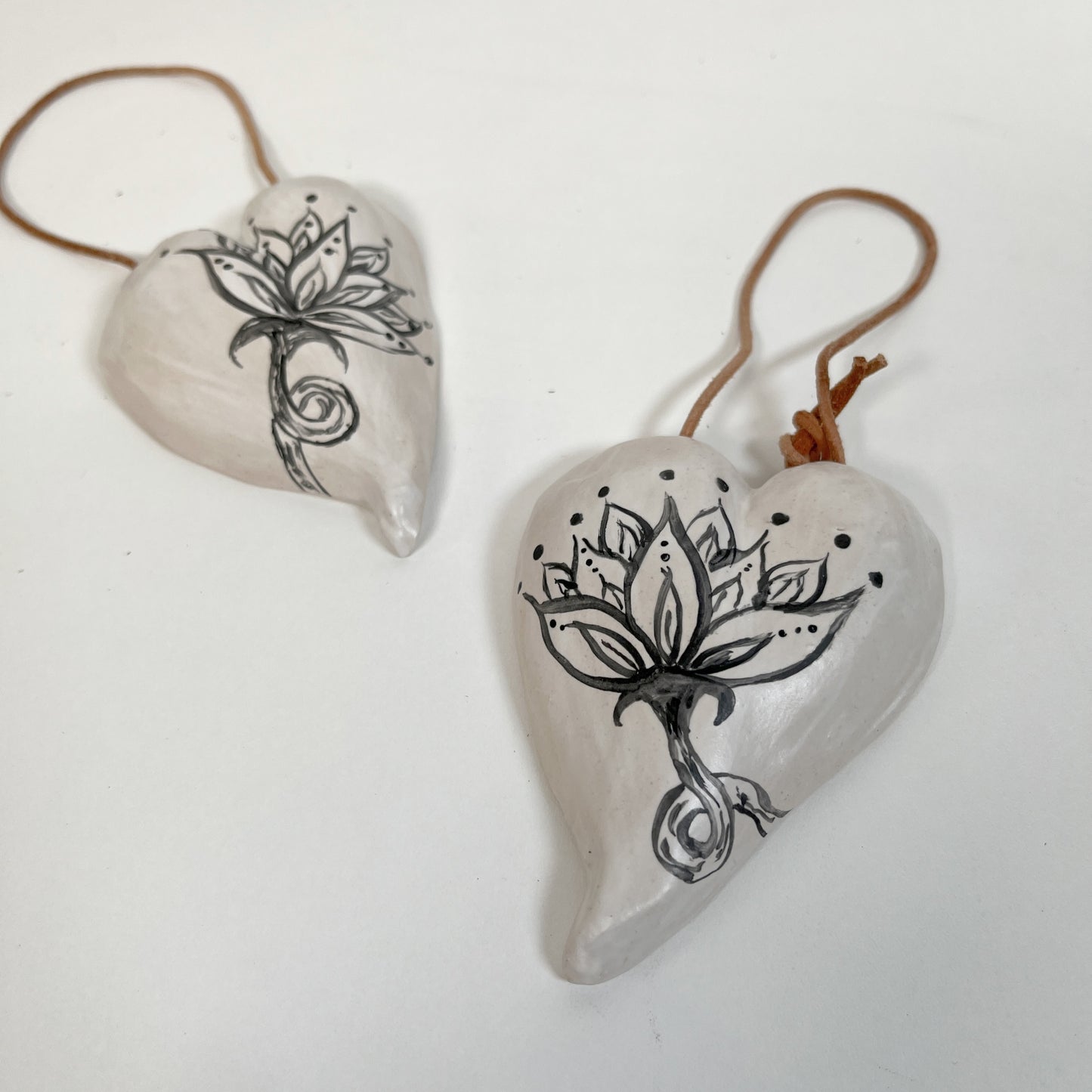 small ceramic heart with hand painted lotus flower