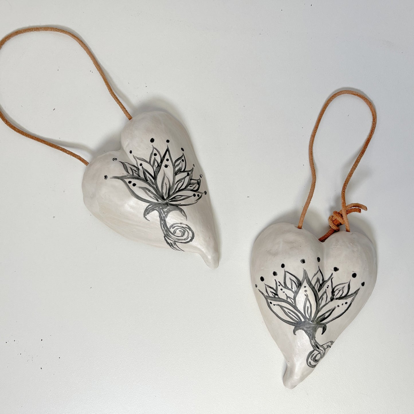 small ceramic heart with hand painted lotus flower